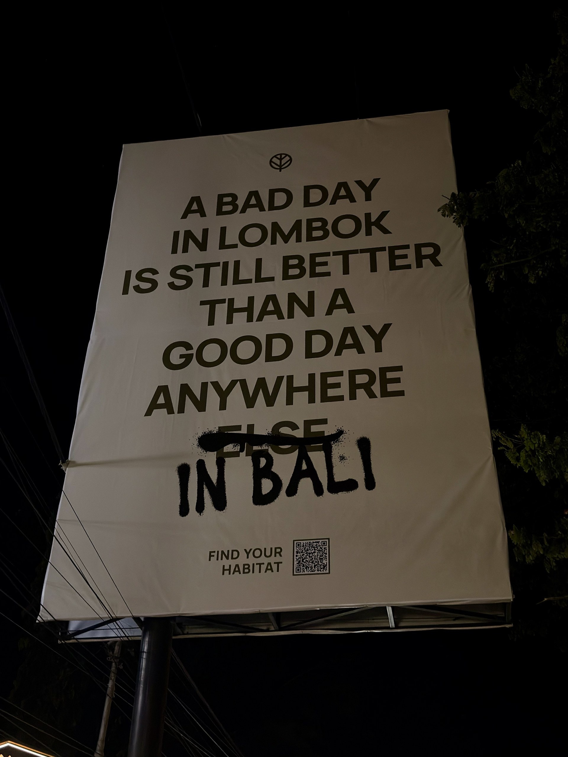 Banner mit der Aufschrift: A bad day in Lombok is still better than a good day anywhere else in Bali